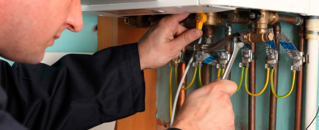 Gas engineer working on a boiler